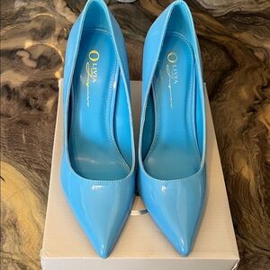 Light blue Olivia Ferguson high heeled pumps. New